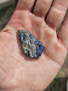 A sherd of Westerwald stoneware found in the well. The piece belongs to a partial Peasants' Wedding jug already in the collection.