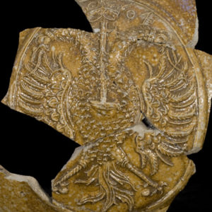 Close-up of Bartmann jug double-eagle medallion