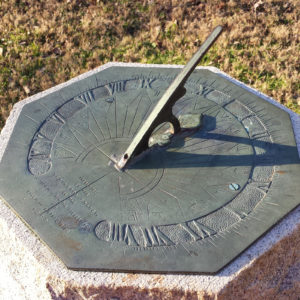 Close-up image of a sundial