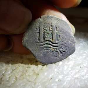 Close-up of Spanish coin