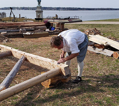Carpenter Danny Whitten working on wooden structure