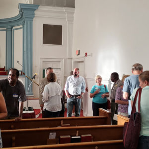 Conversations following the Community Meeting at the First Baptist Church