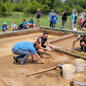 Archaeologists and visitors at the north field excavations