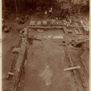 old sepia photograph looking down on an archaeological site