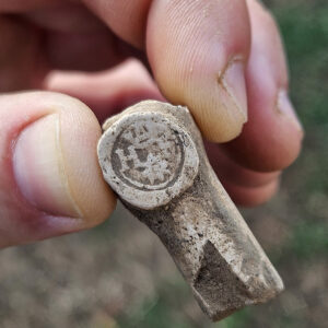 A partial pipe with a stamped heel found in the North Church excavations