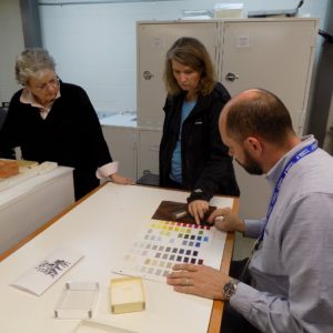 Staff discuss color samples