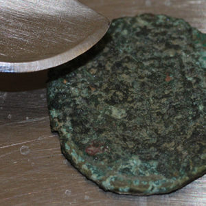 Corroded coin
