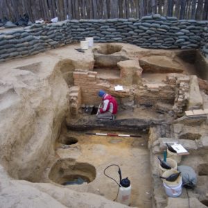 Archaeologist excavating a cellar