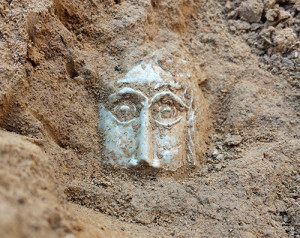 Bartmann jug sherd decorated with molded face in situ