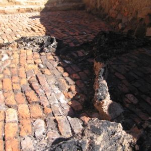 Excavated brick floor