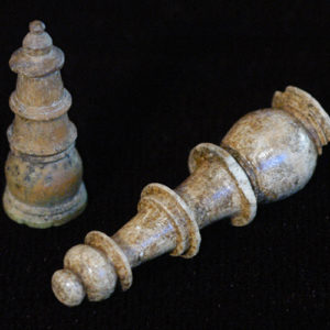 Two carved bone chess pieces