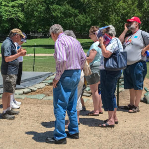 Archaeologist talks to small group
