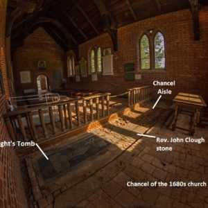 Brick church interior with notated tombstone and chancel