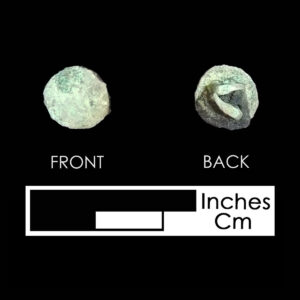 Circular ornament with leather still attached