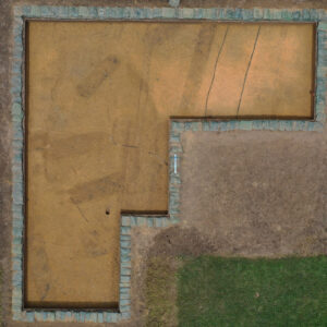 An overview of the excavations south of the Archaearium. Several burials can be seen in the form of dark rectangles.