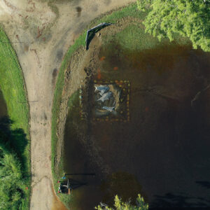 An aerial shot of the inundated barracks excavation caused by Hurricane Erin, August 22, 2025