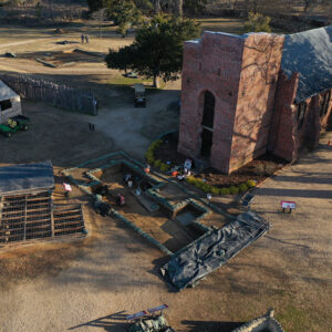 A drone shot of the excavations west of the Church Tower. The cellar excavations can be seen at rear.