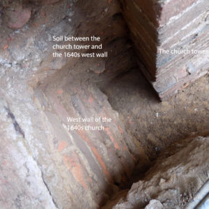 Notated features within brick church tower