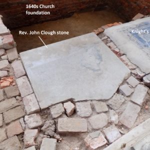 Tombstones set in brick floor