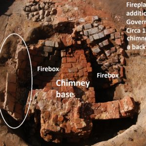 Excavated brick chimney base and firebox
