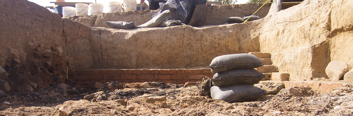 Sandbag and excavated brick wall of excavated cellar