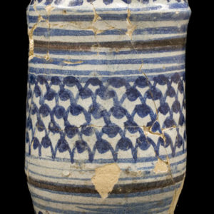 Delftware drug jar with painted blue fish scale pattern around body and blue and brown stripes around base and rim