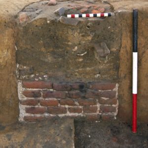 brick feature in the corner of an excavation unit