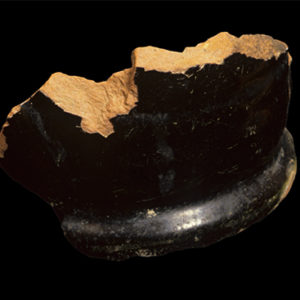 Black-glazed earthenware base sherd