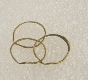 Gold ring with three interlocking parts