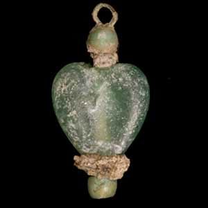 Green heart-shaped glass bead with copper alloy ring