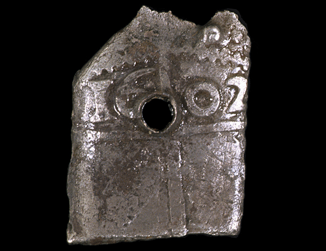 Square-cut 1602 sixpence with hole in top middle