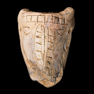Clay pipe bowl incised with horse head and bridle