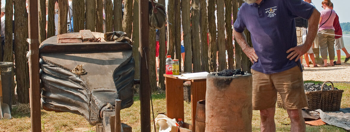 Blacksmith Shel Browder works at an iron bloomery just outside James Fort.