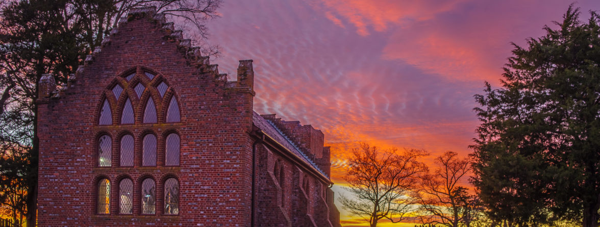 Sunset at Jamestown. Memorial Church in foreground.