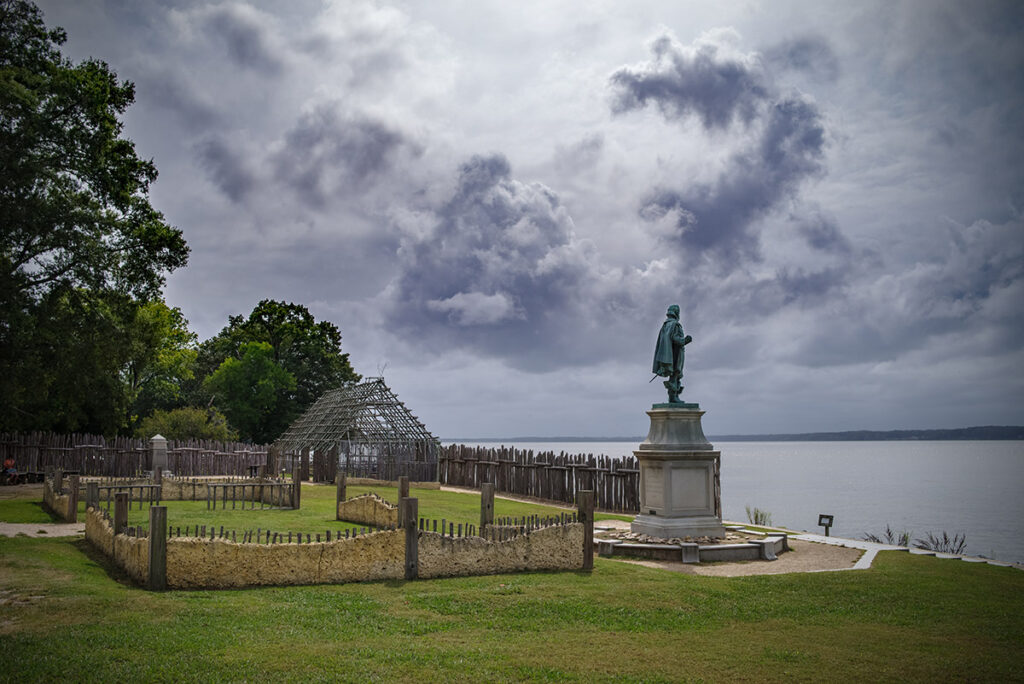 Looking east from inside James Fort. The colony's partially reconstructed first church is at left and the barracks are in the distance.