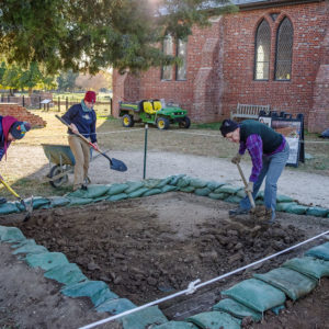 Archaeologists Mary Anna Richardson, Natalie Reid, and Don Warmke begin the excavations of the new square in the north Church Tower area.