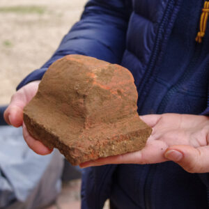 A burnished brick found during the archaeological excavations inside the Church Tower.