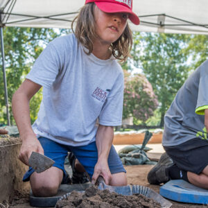 A tray of earth that will soon be screened for artifacts