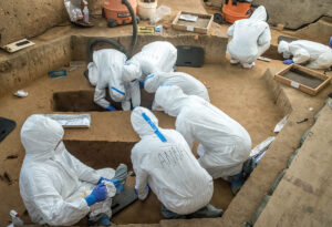 The archaeological team in the 1607 Burial Ground. Human remains digitally removed from the photograph.