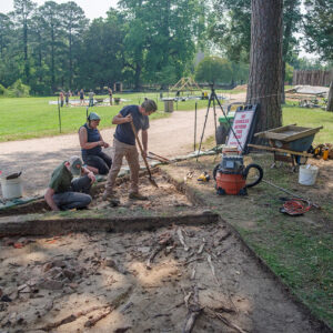 Excavations are slow going at the west "flag" dig due to roots and bricks.