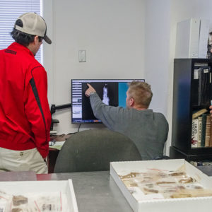 Cam Ward of Pinnacle X-ray Solutions trains Senior Archaeological Conservator Dan Gamble and Archaeological Conservator Don Warmke on the new X-ray software.