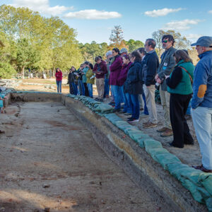 Senior Staff Archaeologist Mary Anna Hartley gives a tour of the Archaearium excavations to Southeastern Archaeological Conference (SEAC) attendees.