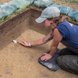 Staff Archaeologist Ren Willis scores the locations of nodules slated for XRF testing.