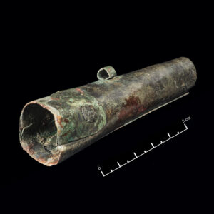 A copper-alloy bandolier bottle with a repair