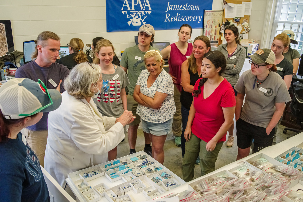 Senior Curator Merry Outlaw shares some of the artifacts in the Vault with a group of Field School students.