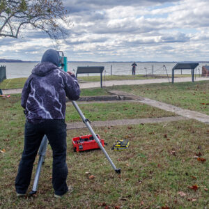 Staff Archaeologist Caitlin Delmas and Archaeological Field Technician Katie Griffith survey the Statehouse area prior to their GPR work.
