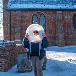Archaeological Field Technician Hannah Barch found a frosted doughnut in a trashcan near the Memorial Church.