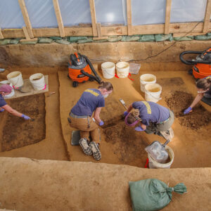 Staff Archaeologists Caitlin Delmas and Natalie Reid, Archaeological Field Technician Ren Willis, and Site Supervisor Anna Shackelford excavate the three burials at the 1607 burial ground.