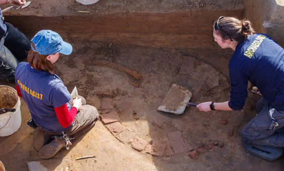 Excavating a 17th-century well found in the Confederate moat