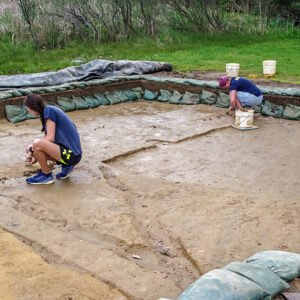 Site Supervisor Anna Shackelford and Staff Archaeologist Caitlin Delmas at work in the clay borrow pit excavations.